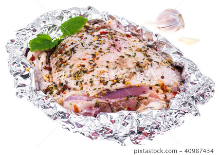 Piece of turkey in foil for baking 40987434