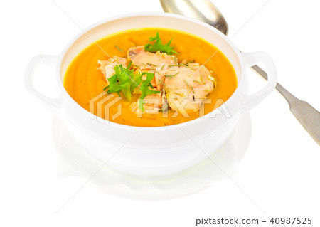Pumpkin cream soup with slices of salmon Pumpkin cream soup with slices of salmon 40987525