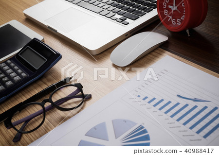 Desk office with laptop,tablet ,analysis report Desk office with laptop,tablet ,analysis report 40988417