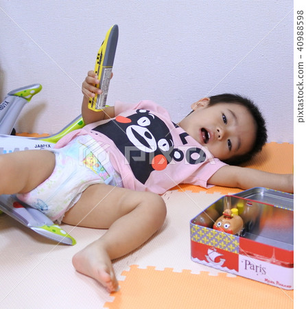 One-year-old boy with disposable diapers 40988598