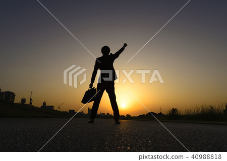 Businessman who plays guts pose Businessman who plays guts pose 40988818