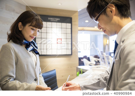 Receptionist receptionist reception desk check-in check-in Receptionist receptionist reception desk check-in check-in 40990984