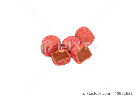 Chocolate truffles with raspberry closeup Chocolate truffles with raspberry closeup 40991621