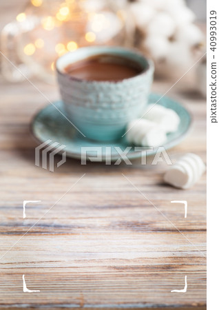 Wooden table and hot cocoa mug blurred Wooden table and hot cocoa mug blurred 40993019