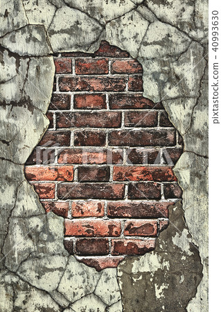old brick wall with crumbling plaster cracked 40993630