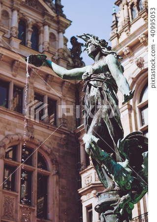 Bronze statue of Hygieia on Brunnen fountain near Hamburger Rathaus - Town Hall 40995053