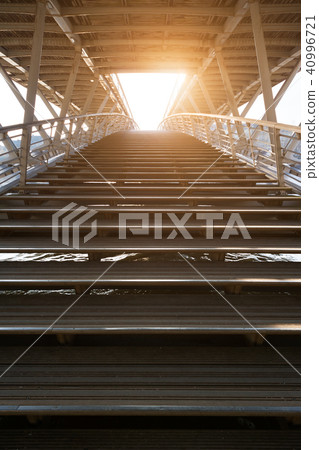 Stairs of solferino bridge against sun in Paris 40996721