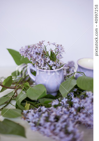 Gently purple bowl in the shape of a Bud, covered with icing. The skill of the ceramist.With 40997258