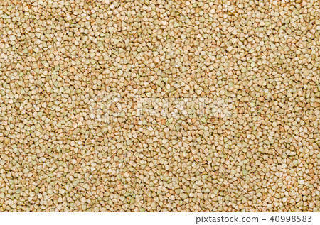 Hulled common buckwheat grains surface 40998583