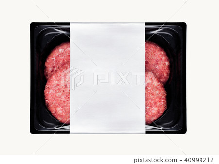 Raw fresh beef burgers in plastic tray on white Raw fresh beef burgers in plastic tray on white 40999212