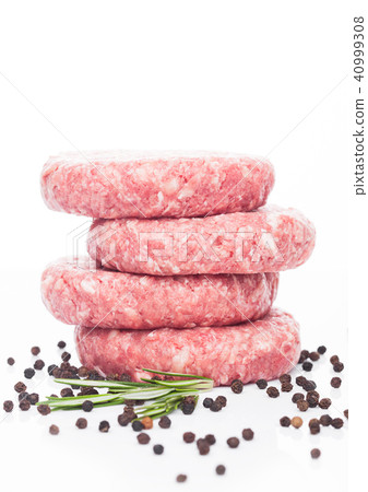 Raw fresh beef burgers with pepper and rosemarine 40999308