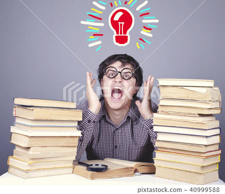 The young student with the books isolated.  40999588