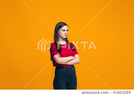 Young serious thoughtful teen girl. Doubt concept. Young serious thoughtful teen girl. Doubt concept. 41001089