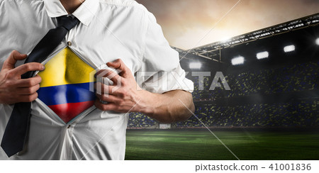 Colombia soccer or football supporter showing flag 41001836