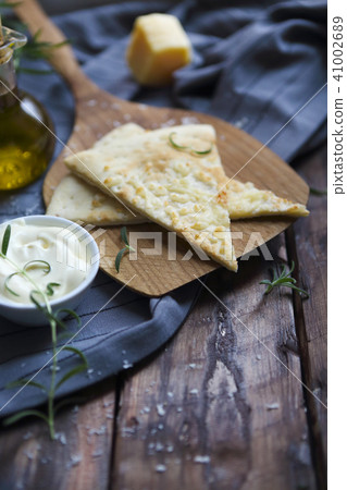 Focaccia with olive oil, parmesan cheese, white s Focaccia with olive oil, parmesan cheese, white s 41002689