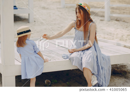 Mother with daughters 41005065