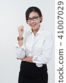Business woman posing on whiteboard on white  41007029