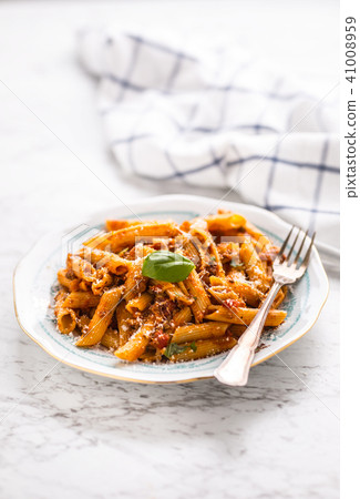 Italian food and pasta pene with bolognese sause 41008959
