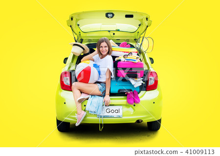 Ready to travel. Woman in Car before Travel 41009113