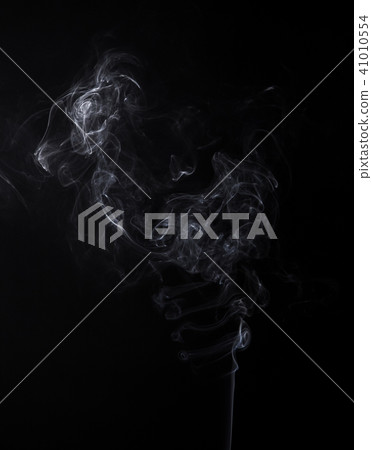 Smoky swirl of smoldering aromastick 41010554