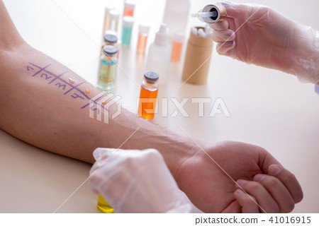 Doctor testing allergy reaction of patient in hospital Doctor testing allergy reaction of patient in hospital 41016915