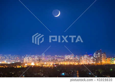 City at night with new moon City at night with new moon 41019810