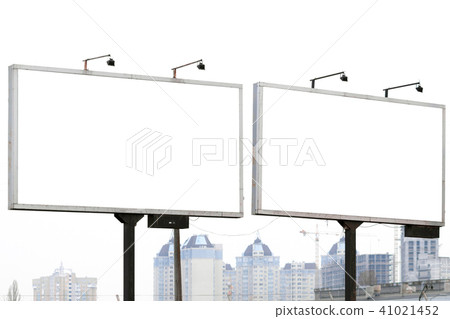 Two billboards against cloudy cityscape. Two billboards against cloudy cityscape. 41021452