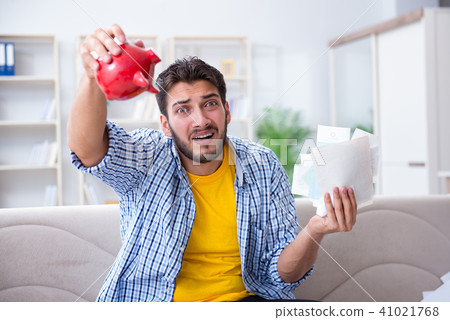 Man angry at bills he needs to pay Man angry at bills he needs to pay 41021768