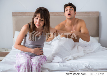 Woman and man in the bedroom Woman and man in the bedroom 41021794