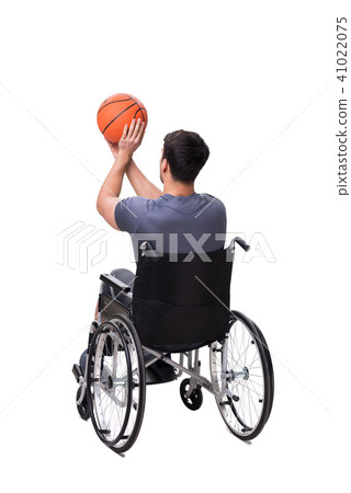 Basketball player recovering from injury on wheelchair Basketball player recovering from injury on wheelchair 41022075