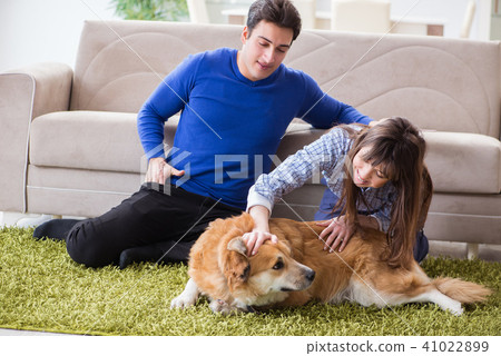 Happy family with golden retriever dog Happy family with golden retriever dog 41022899