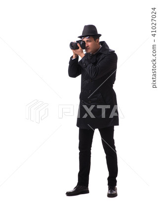 Spy with camera taking pictures isolated on white Spy with camera taking pictures isolated on white 41027024