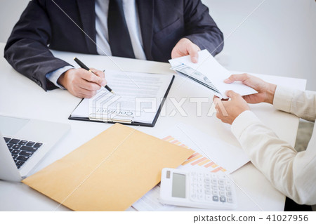 Bribery and corruption concept, bribe in the form of dollar bill 41027956