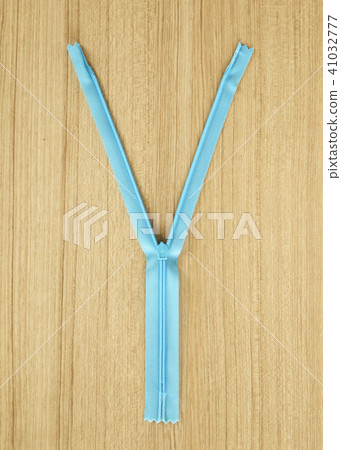 Blue zipper concept background Blue zipper concept background 41032777