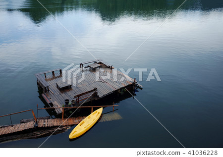 Fantastic lake with ship in Thailand national park 41036228