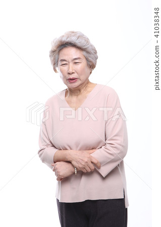 Asian woman's facial expression, senior, middle-aged, elderly, grandmother, close-up, laughing, sadness, solitude, health 41038348