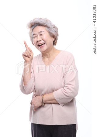 Asian woman's facial expression, senior, middle-aged, elderly, grandmother, close-up, laughing, sadness, solitude, health 41038392