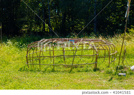 wooden skeleton made for indian sauna in open summer landscape. wooden skeleton made for indian sauna in open summer landscape. 41041581