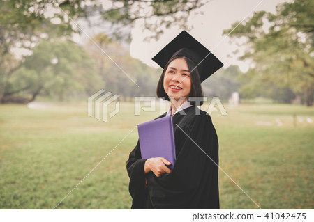 Graduation Concept. Graduated students on graduation day. Asian Graduation Concept. Graduated students on graduation day. Asian 41042475