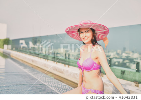 Swimsuit Concept. Beautiful girl wearing pink swimsuit. Beautifu 41042831