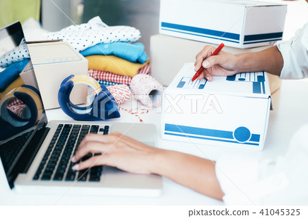 Young small online business owner  41045325