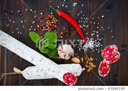 Sliced cured sausage with spices 41046190
