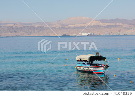 Touristic ships on the beach of Aqaba, Jordan. Pop 41048339