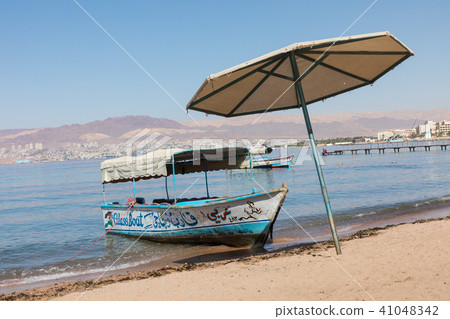 Touristic ships on the beach of Aqaba, Jordan. Pop 41048342
