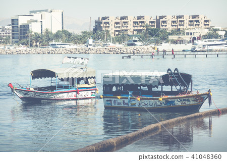 Touristic ships on the beach of Aqaba, Jordan. Pop 41048360