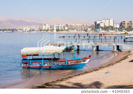 Touristic ships on the beach of Aqaba, Jordan. Pop 41048365