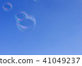 Soap bubbles and blue sky 41049237