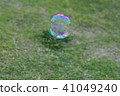 Soap bubbles and lawn 41049240