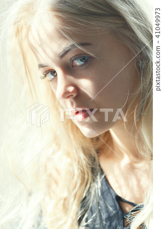 sad blonde woman sad blonde woman 41049973
