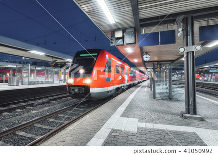 Passenger high speed train on the railway station 41050992